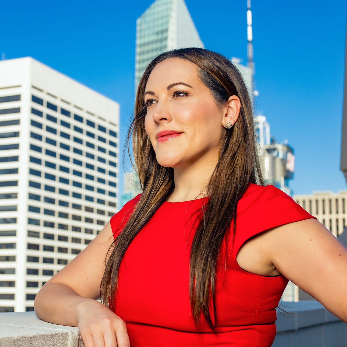 Woman smiling on a balcony