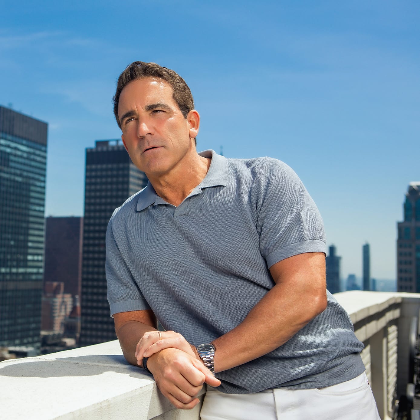 Man standing on a balcony