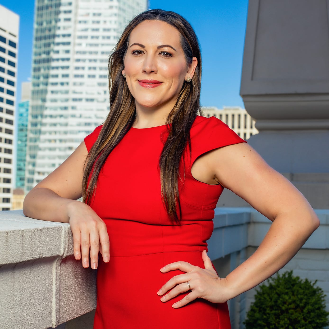 Woman smiling on a balcony