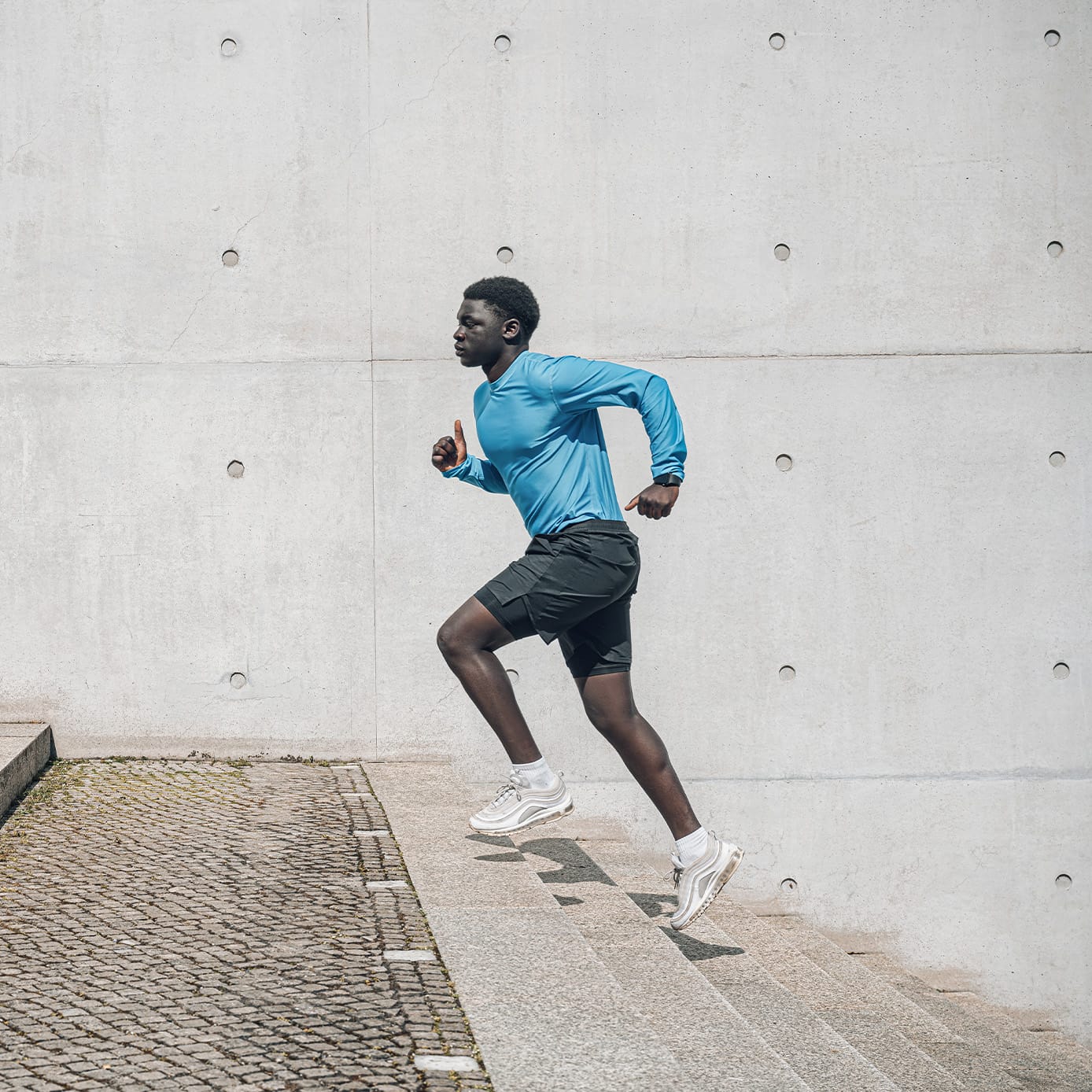 Man running up stairs