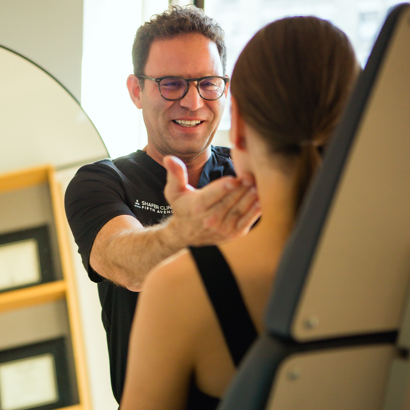 Dr. Shafer with a female patient