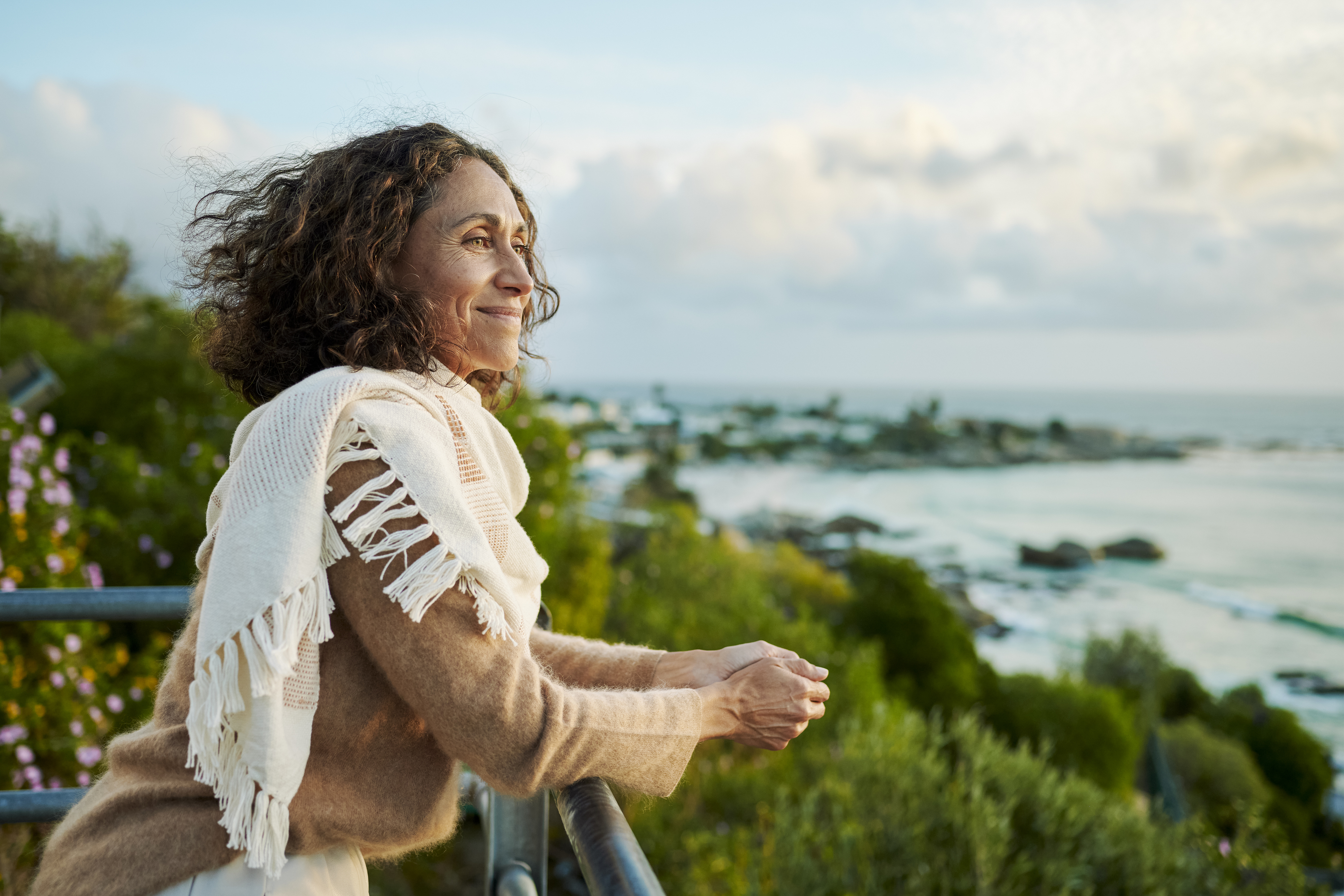 woman looking out at the ocean